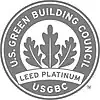 Gray-and-white logo with three leaves